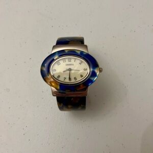 💜 Geneva Oval Marble Ladies Analog Clamp Watch